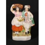 Staffordshire figure of couple. Condition Report 33.5cm high.