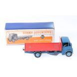 Dinky Toys 512 Guy flat truck, 1st type cab with blue cab and chassis, mid blue ridged hubs,