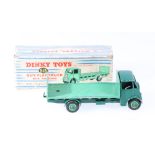 Dinky Toys 513 Guy flat truck with tailboard, 1st type cab with dark green cab and chassis,