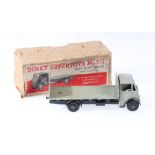 Dinky Toys 513 Guy flat truck with tailboard, 1st type cab with grey cab and flatbed, black chassis,