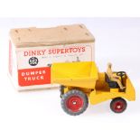 Dinky Toys 562 Muir Hill dumper truck with yellow body and red hubs,