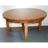 Mid 20th century walnut extending dining table with cavity interior (lacking leaf),