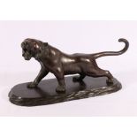 Japanese bronze model of a tiger with inset glass eyes, wooden base, signed to base, Meiji / Taisho,