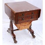 Regency mahogany drop-end table with two frieze drawers, raised on paw feet.