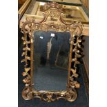 Gilt framed Chippendale style mirror, 95 x 54.