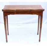 19th century mahogany and satinwood crossbanded fold-over games table,