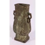 Large Chinese late 19th century bronze vase of archaic form with lion and ring handles,