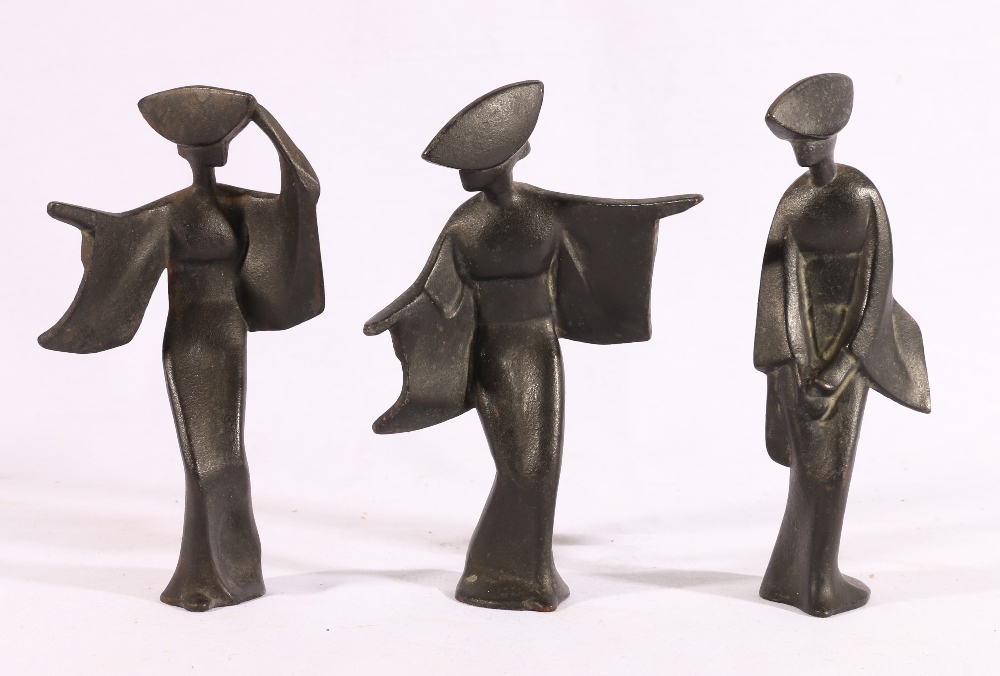 Three Japanese cast iron figures of geishas c1950's, 18cm.