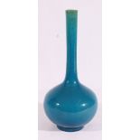 Japanese turquoise glazed bottle vase with elongated neck,