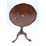 19th century mahogany and walnut tilt top occasional table, raised on turned column,