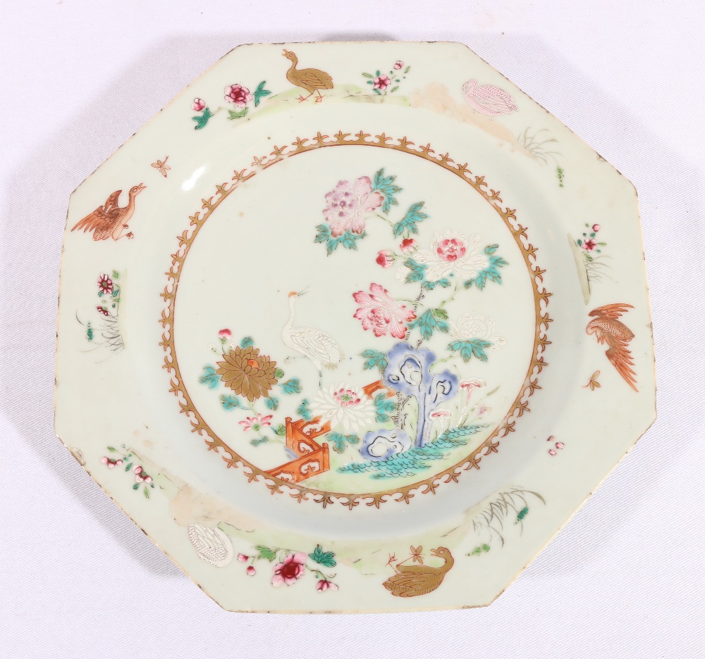 Chinese 18th century octagonal dish with enamelled decoration of a crane in a garden setting,