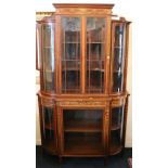 Late Victorian mahogany cabinet decorated with painted designs of swags,