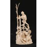 Carved Japanese ivory okimono of two figures, one walking on a watermill, signed to base, 12.