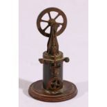 Miniature model in brass of a steam pump with fly wheel, wooden base. 10.