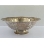 Silver shallow bowl,hammered, on spreading foot by Georg Jensen, Import Marks 1932, 27cm,