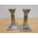 Pair of E.P. dwarf candlesticks with fluted Corinthian columns by Walker & Hall c1900, 15.4cm.