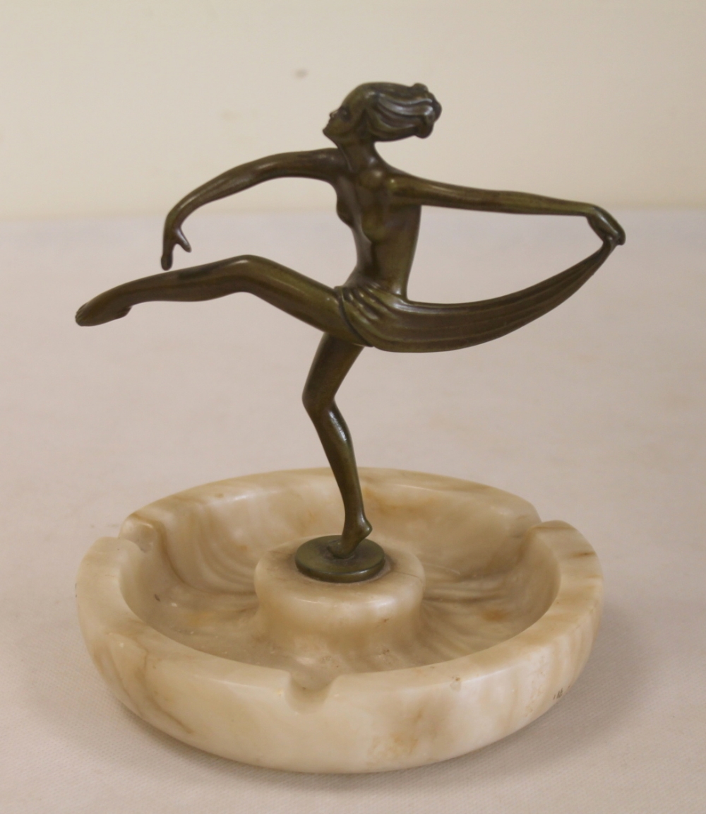 Bronze Art Deco figure of a dancer raised on a alabaster ashtray base.