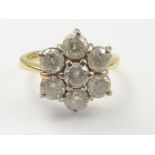 Diamond cluster ring with seven brilliants each approx. .3ct in 18ct gold, size 'N ½'.