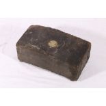 Wooden cobble bearing plaque inscribed "From Princess Street,