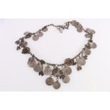 Coin Art, a silver and white metal fringe necklace with dependant Arabic coins,