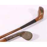 Hickory shafted rut type iron and a hickory shafted Nelson of Peebles driver (2)