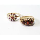 Garnet ring and another, with opals, in 9ct gold, both size R.