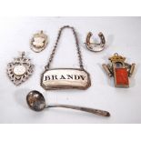 Miniature silver ladle, Birmingham 1804, two silver medallions, a similar scarf pin,