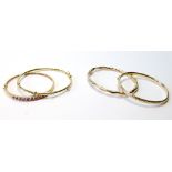 Gem-set gold hinged bangle and three others, all 9ct, 24g.