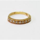 Diamond half-eternity ring with nine brilliants in 18ct gold, size L, 3g.