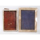 Two silver photograph frames for images 13.5cm x 9.5cm and 13.5cm x 8.5cm.