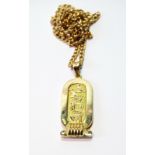 Egyptian gold plaque pendant, probably 18ct, on 9ct necklet, 15g.