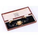 Lady's International watch, square bronze dial No1023823 in International Watch Co gold case "750",