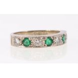 Diamond and emerald half eternity ring with four brilliants in 18ct white gold 1978,, size L 1/2. 4.