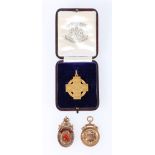 Two 9ct gold medallions "P.J.F.A.....Caledonian FC...