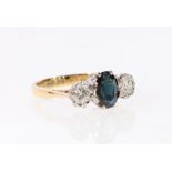 Diamond and sapphire three stone ring, the brilliants approximately .15ct, 18ct plat. size L1/2.