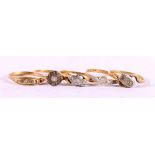 5 18ct gold diamond set rings, 9.48g.