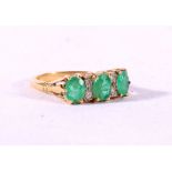 18ct gold diamond and green stone dress ring, size L, 3.8g.