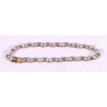 9ct gold bracelet set with pale blue stones, 4.67g.