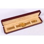 Gentleman's Zenith wristwatch with 9ct gold bezel and a gate link bracelet, 37.6g gross.