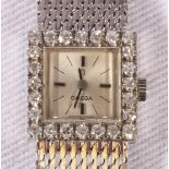 Ladies 18ct white gold Omega wristwatch, the bezel set with twenty four round cut diamonds,