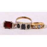 Unhallmarked white metal garnet and diamond ring, size K, 4.