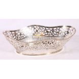 Dutch grade I silver pierced basket with 12 October 1957 - 1997 to base, 476g, 31cm long.