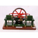 Model cross over engine built by Albert Ranaldi, 36 cm long raised on a wooden plinth.