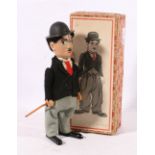 Schuco clockwork figure of Charlie Chaplin 18cm tall in original box CONDITION REPORT: