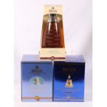 Three bottles of BELL'S 8 year old blended whisky including Millennium 2000 70cl 40%volume,