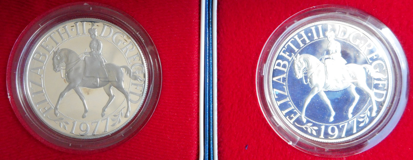 United Kingdom. Crown. (2) 1977 Silver Jubilee. Silver Proof. Both cased.