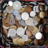Tin of various coins.