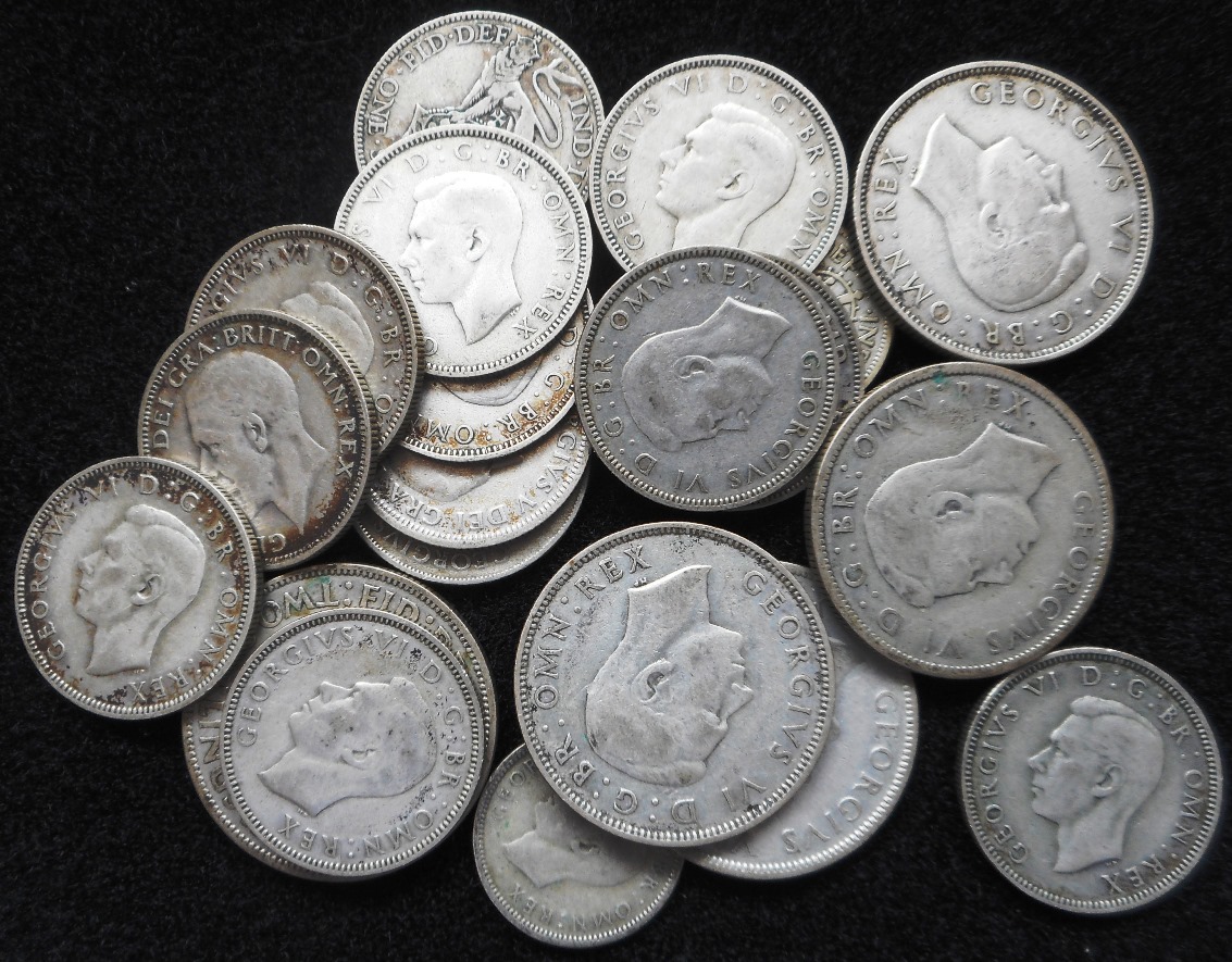 Small collection of pre-1947 silver coins. Condition Report. 144.5gm.