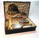 Silver-mounted toilet set comprising a mirror and three brushes, 'Extra Heavy Silver',