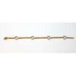 18ct coloured gold bracelet with four diamond-set hearts at intervals, 20g.